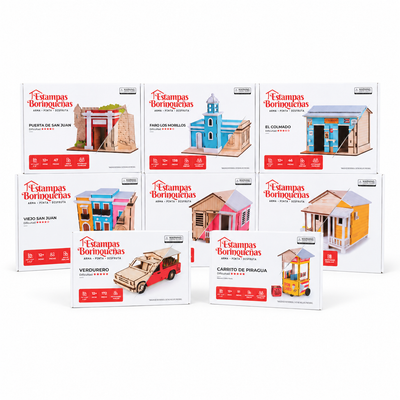 Fotografía de las 8 cajas de la colección completa de Estampas Borinqueñas: El Colmado, Puerta de San Juan, El Faro Los Morrillos, El Viejo San Juan, Casita de Campo Primavera, Casita de Campo Alegría, El Verdurero Boricua y El Piragüero.