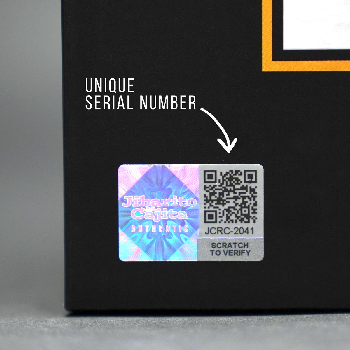 Holographic authenticity seal with unique serial number and QR code on the Roberto Clemente collector's set box
