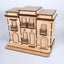Fotografía de la maqueta de madera El Viejo San Juan completamente ensamblada en su estado natural, mostrando los detalles arquitectónicos de los balcones y la fachada antes de ser pintada.