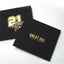 The Great One Roberto Clemente book with black cloth cover and gold foil title beside a gold foil number 21 sleeve